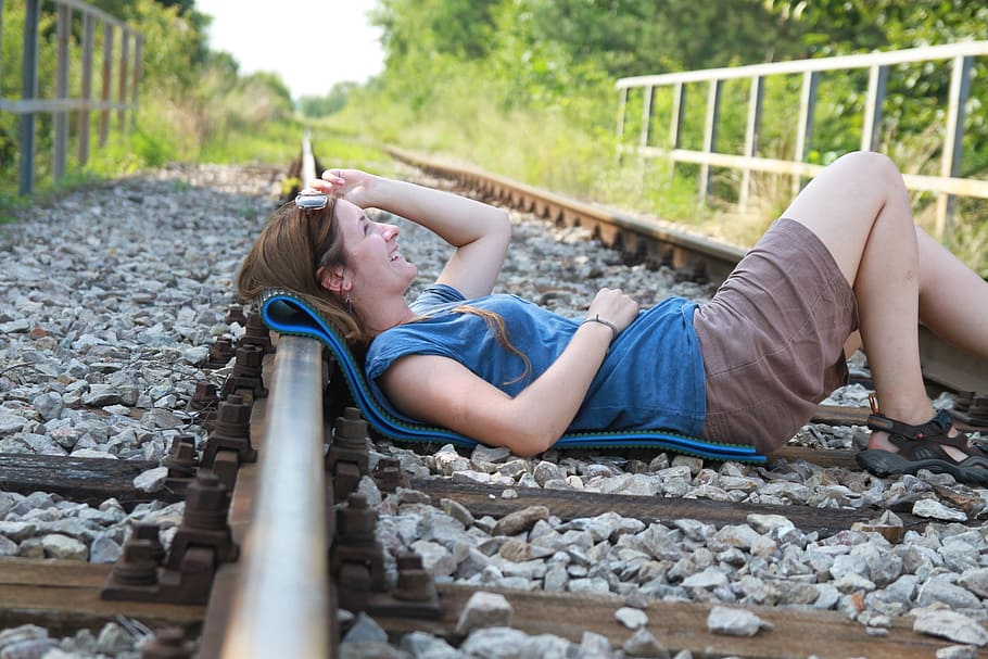the little girl, tracks, splint, railway, one person, casual clothing,  lying down, leisure activity, relaxation, lifestyles | Pxfuel