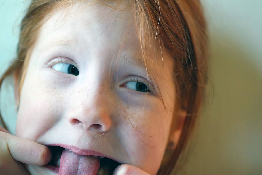 girl, leaning, white, painted, wall opening tongue, wall, opening, tongue, kid, facial