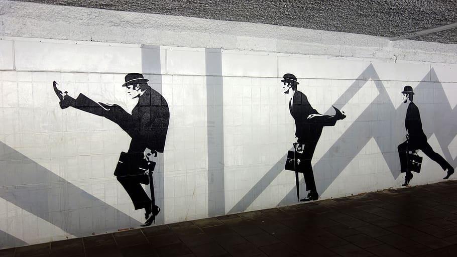 bicycle tunnel, pedestrian tunnel, tunnel, mural, drawing, john cleese, silly walks, work of art, art, wall