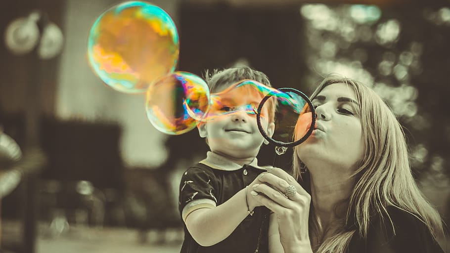 woman, wearing, black, top, child, playing, bubbles, son, mother, family