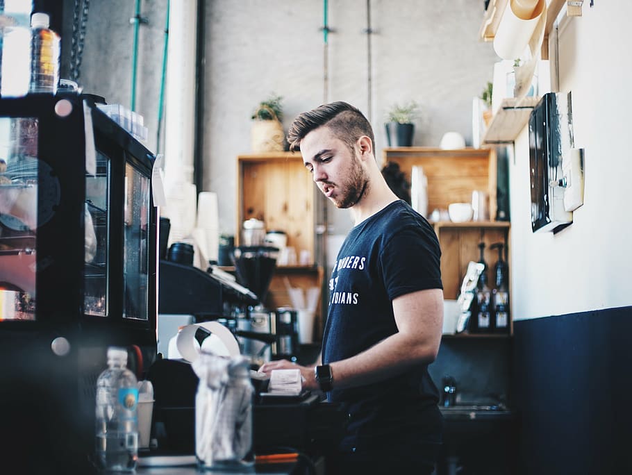 man, standing, front, coffeemaker photograph, people, counter, cashier, restaurant, store, shop