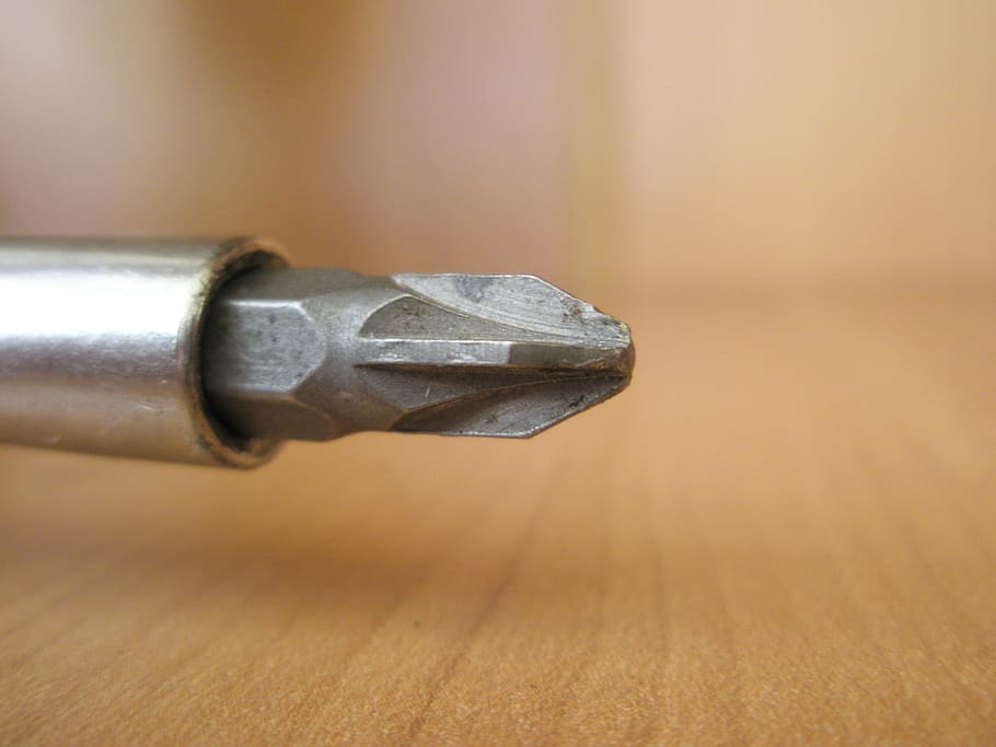 screwdriver, tool, grey, indoors, metal, close-up, copy space, single object, connection, focus on foreground