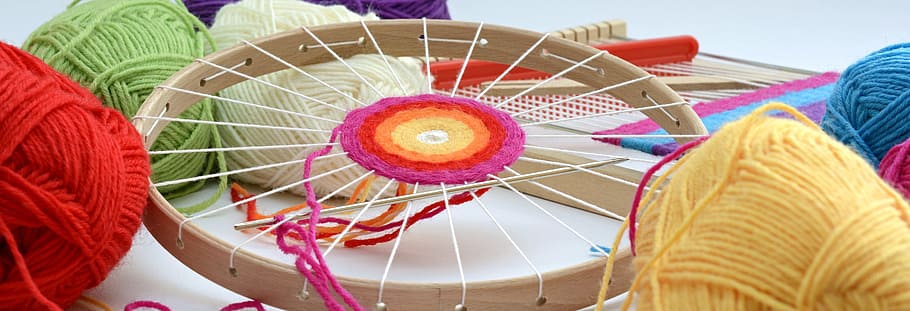 round, brown, wooden, frame, assorted-color threads, yarns, wool, web framework, weave, color