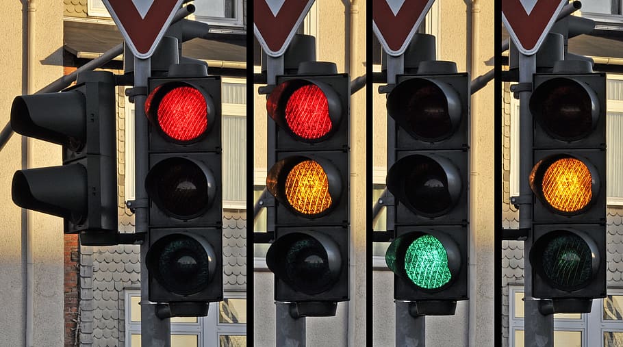 several traffic lights, traffic light, signal, traffic, street, road, sign, safety, stoplight, transportation
