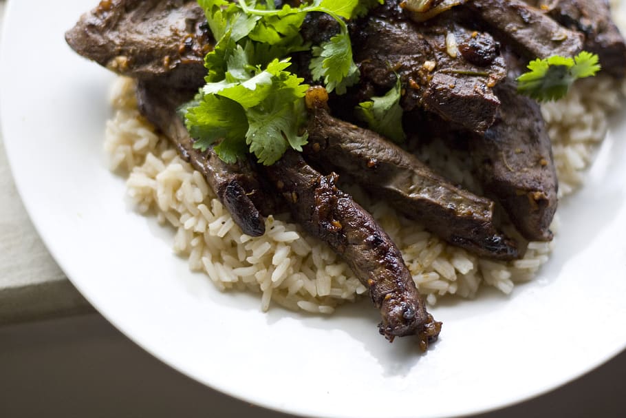 beef hearts, rice, cuisine, gourmet, cilantro, white plate, beef, food, dish, cooked