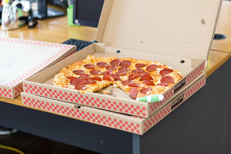 photograph, kirkland signature pepperoni pizza, box, table, pizza, food, takeout, pepperoni, office, snack