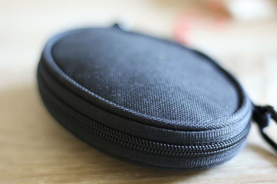 sleeve, glasses case, photo cover, fabric cover, close-up, focus on foreground, indoors, selective focus, sport, security
