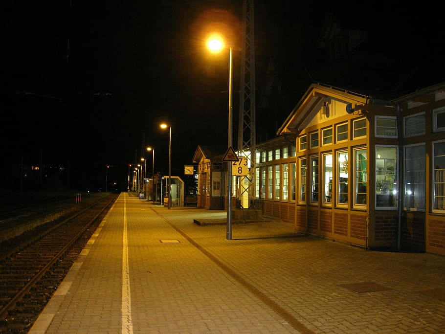 germany, train station, platform, railway, railroad, depot, buildings, night, evening, lights