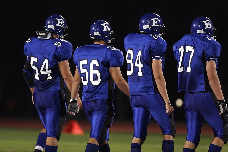 four, football quarterbacks, field, football, american football, game, players, sport, helmet, competition