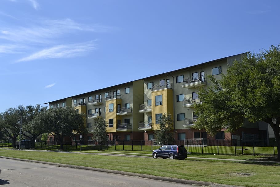 gray, suv, beige, apartment building, houston texas apartment complex, grass, blue sky, clear skies, housing, street