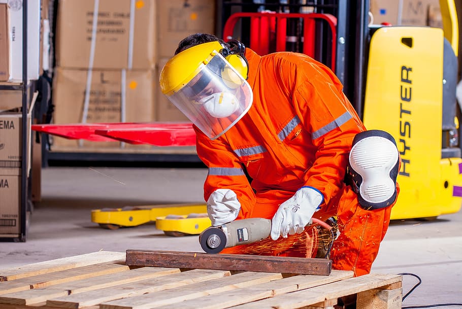 man, holding, brown, angle grinder, industrial, security, logistic, work clothes, industrial safety, protective goggles