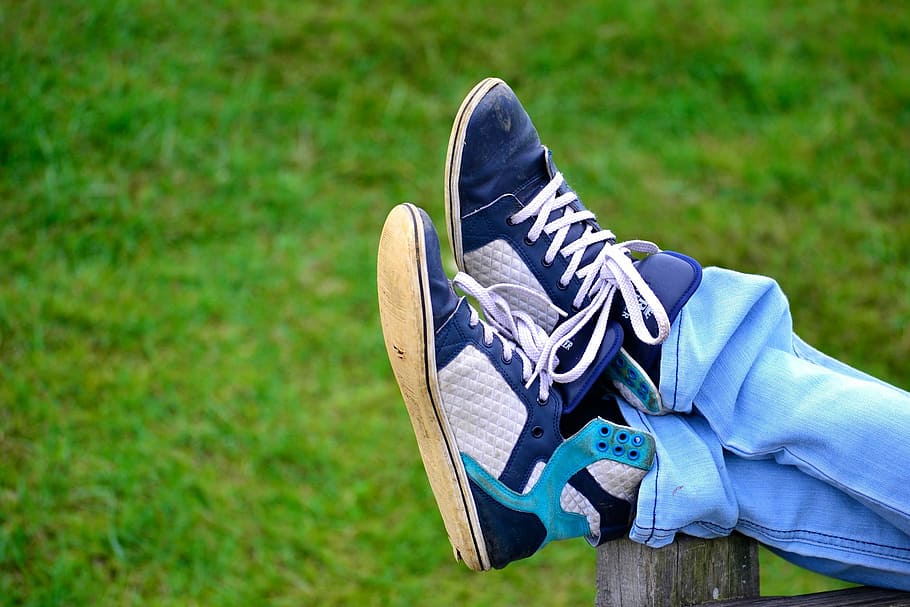 person, wearing, blue-and-gray high-top sneakers, blue-and-gray, high-top, sneakers, shoes, park, rest, relax