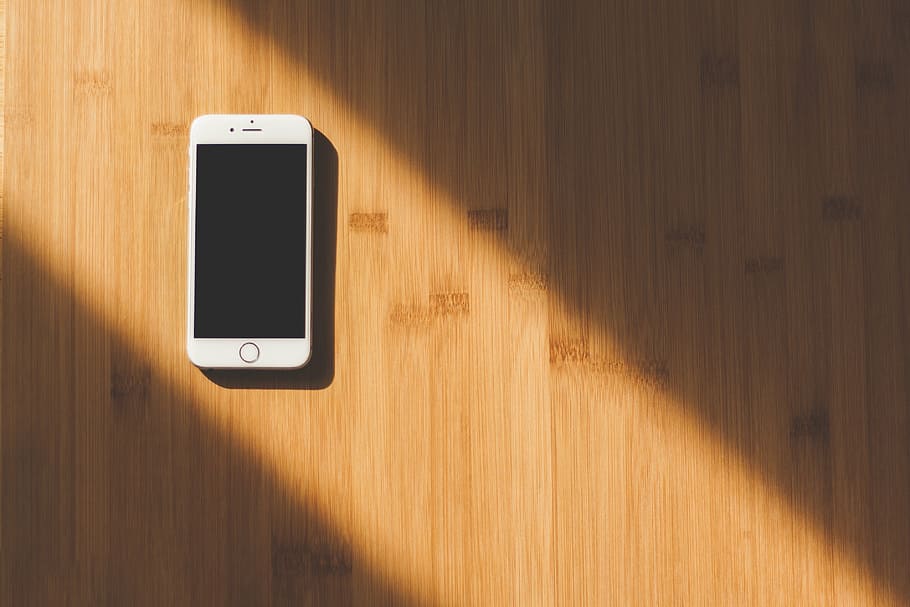 silver iphone 6, wooden, surface, gold, iphone, sunlight, brown, floor, mobile, smartphone