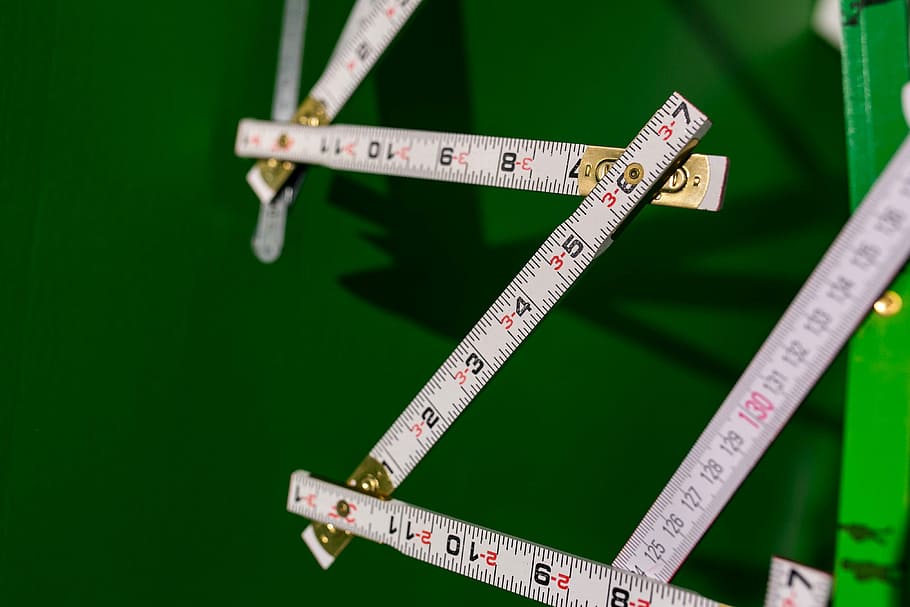 extandable, wooden, ruler, green, background, measure, extendable, instrument of Measurement, measuring, green color