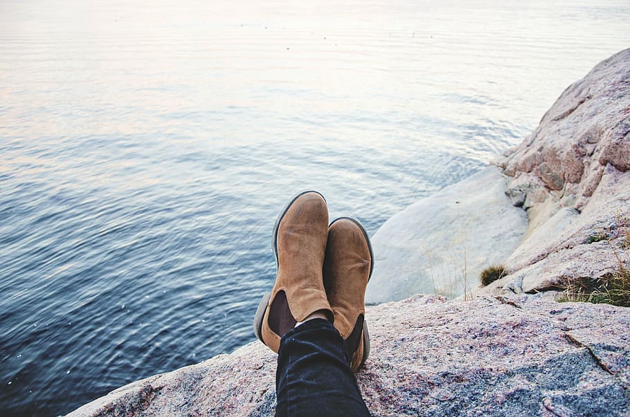person, wearing, brown, suede chelsea boots, people, boots, water, ocean, sea, rock