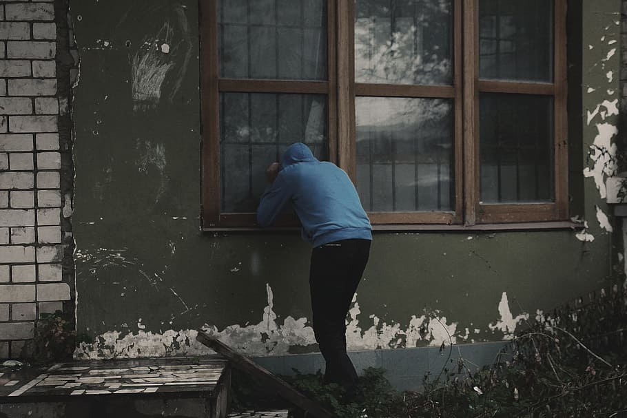 person, wearing, blue, hoodie, looking, window, devastation, peeping, theft, thief