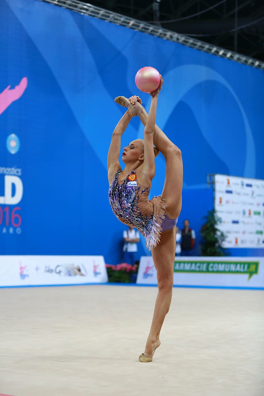 woman doing gymnast, gymnast, gymnastics, rhythmic gymnastics, sport, race, competition, athlete, physical activity, indoor
