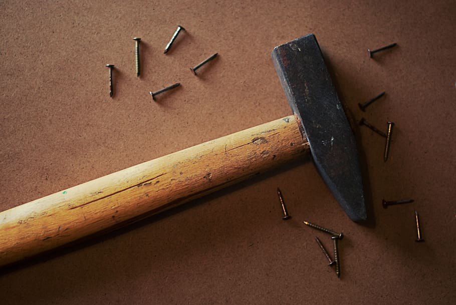 hammer, nails, tools, objects, indoors, wood - material, work tool, still life, metal, choice