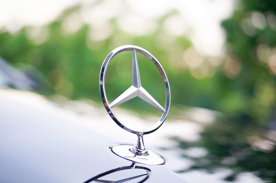 mercedes-benz, mercedes benz car logo, mercedes-benz three-pointed star, car car logo, high-end car, vehicle logo, focus on foreground, close-up, day, glasses