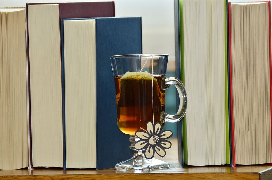 brown, liquid, clear, glass mug, tee, tea glass, drink, hot drink, books, read