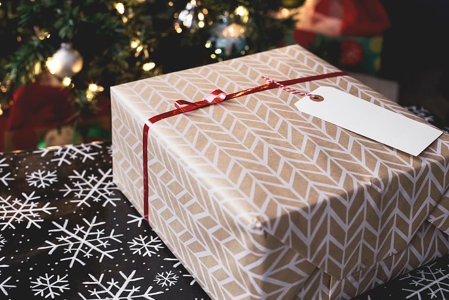 beige, white, gift box, brown, snowflake print textile, wrap, gift, black, table, christmas