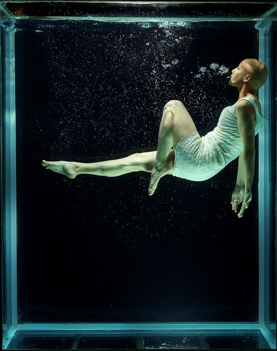 person, floating, water, under water, fashion, woman, increased, tank, fine art, model