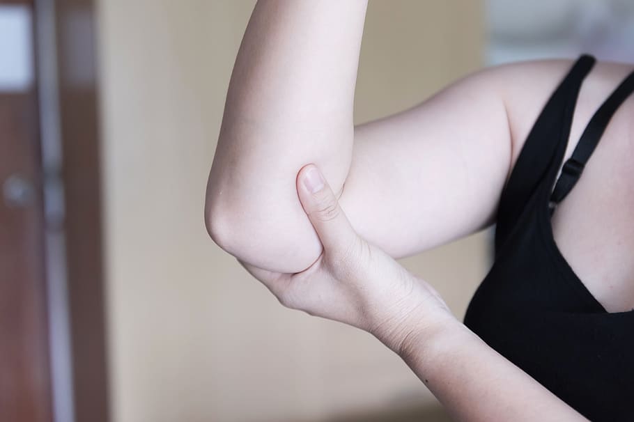 person's left elbow, body, people, lifestyle, person, healthy, young, female, woman, fitness