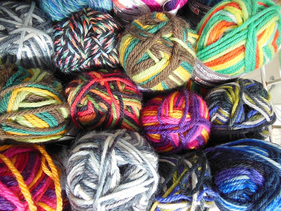 assorted-color rolled yarns, yarn, colored, multi-colored, knitting, needlework, sock yarn, blue, green, red