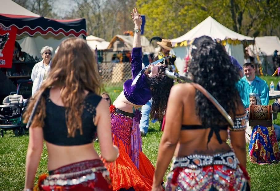 belly dancing, dancer, faire, sword, woman, watching, focus, people, festival, group