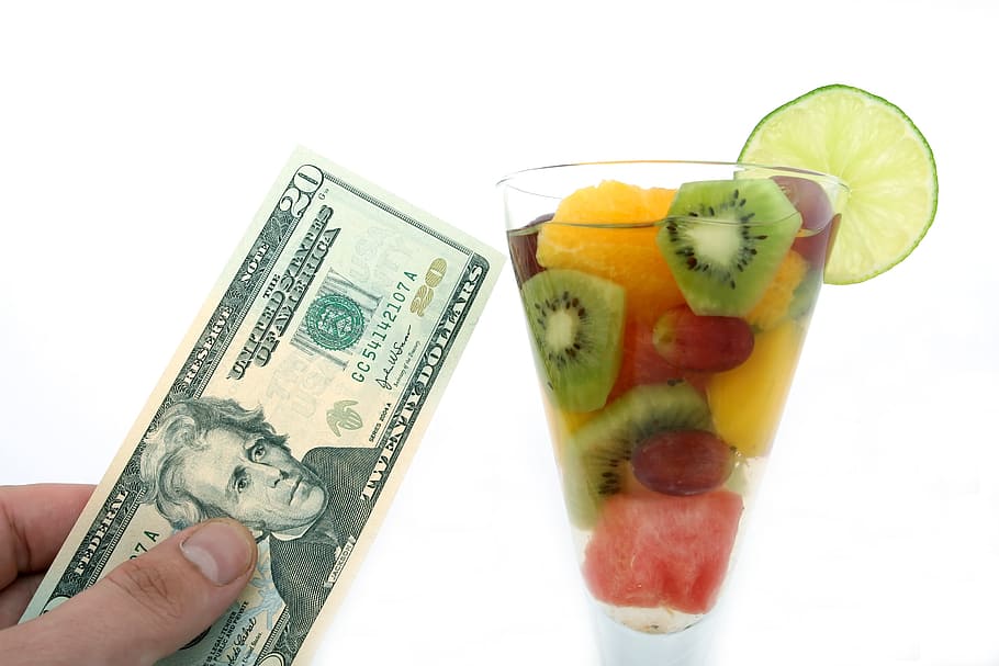 person, holding, 20 u.s, u.s., dollar, cup, sliced, fruits, alcohol, bar