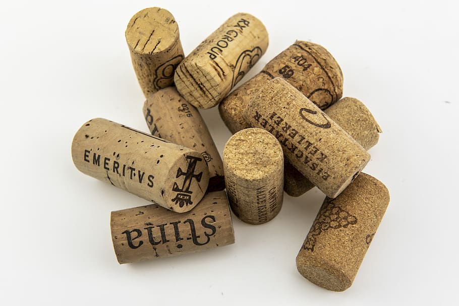 cork, stopper, cork stopper, wine stopper, winery, wine, bar, studio shot, text, white background