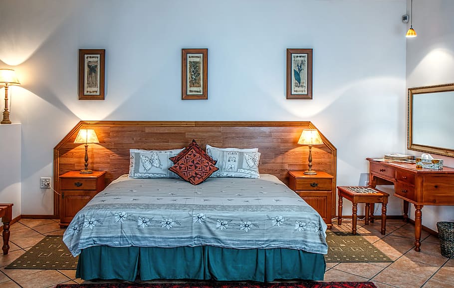 brown, wooden, bed, green, white, floral, comforter, set, bedroom, bedside lamp
