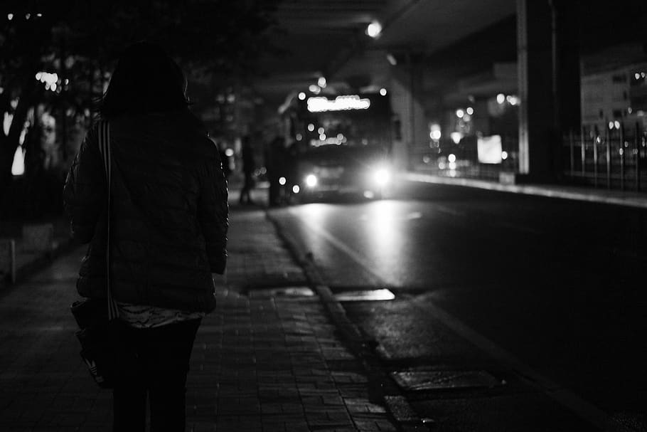 bus, transportation, vehicle, road, dark, night, black and white, monochrome, city, one person