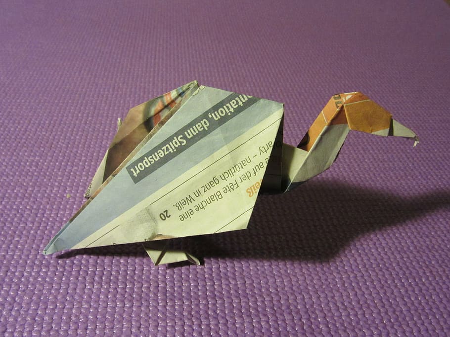 origami, vulture, paper, animal, bird, newsprint, newspaper, text, indoors, business