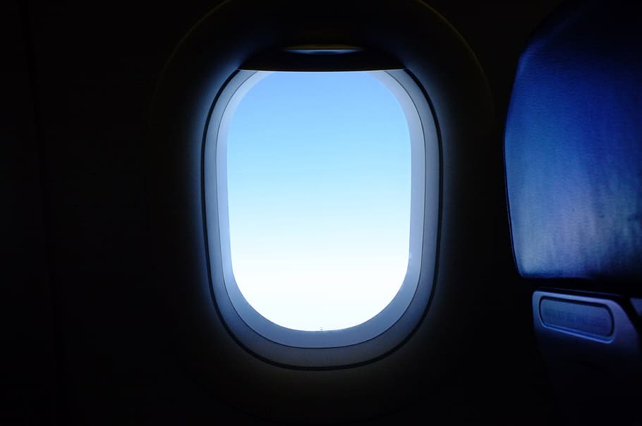 airplane window, airplane, window, flight, travel, transportation, trip, blue, air vehicle, mode of transportation
