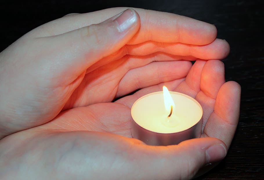 gray candle holder, candle, tealight, light, children's hands, protect, flame, candlelight, hell, human body part