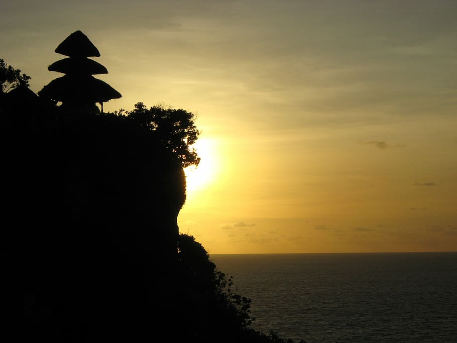 silhouette photo, mountain cliff, tree, sunset, bali, cliff, sky, silhouette, beauty in nature, water