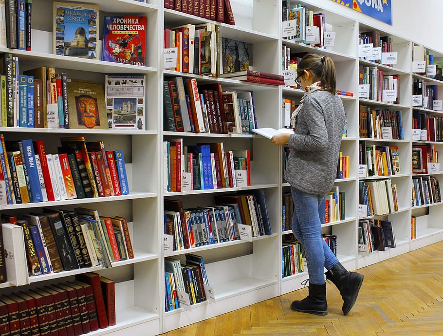 woman reading book, shelves, girl, library, books, reading, education, public, development, culture