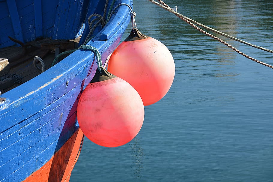 two, round, orange, metal balls, boat, starboard, wharf, sea, marine, buoys