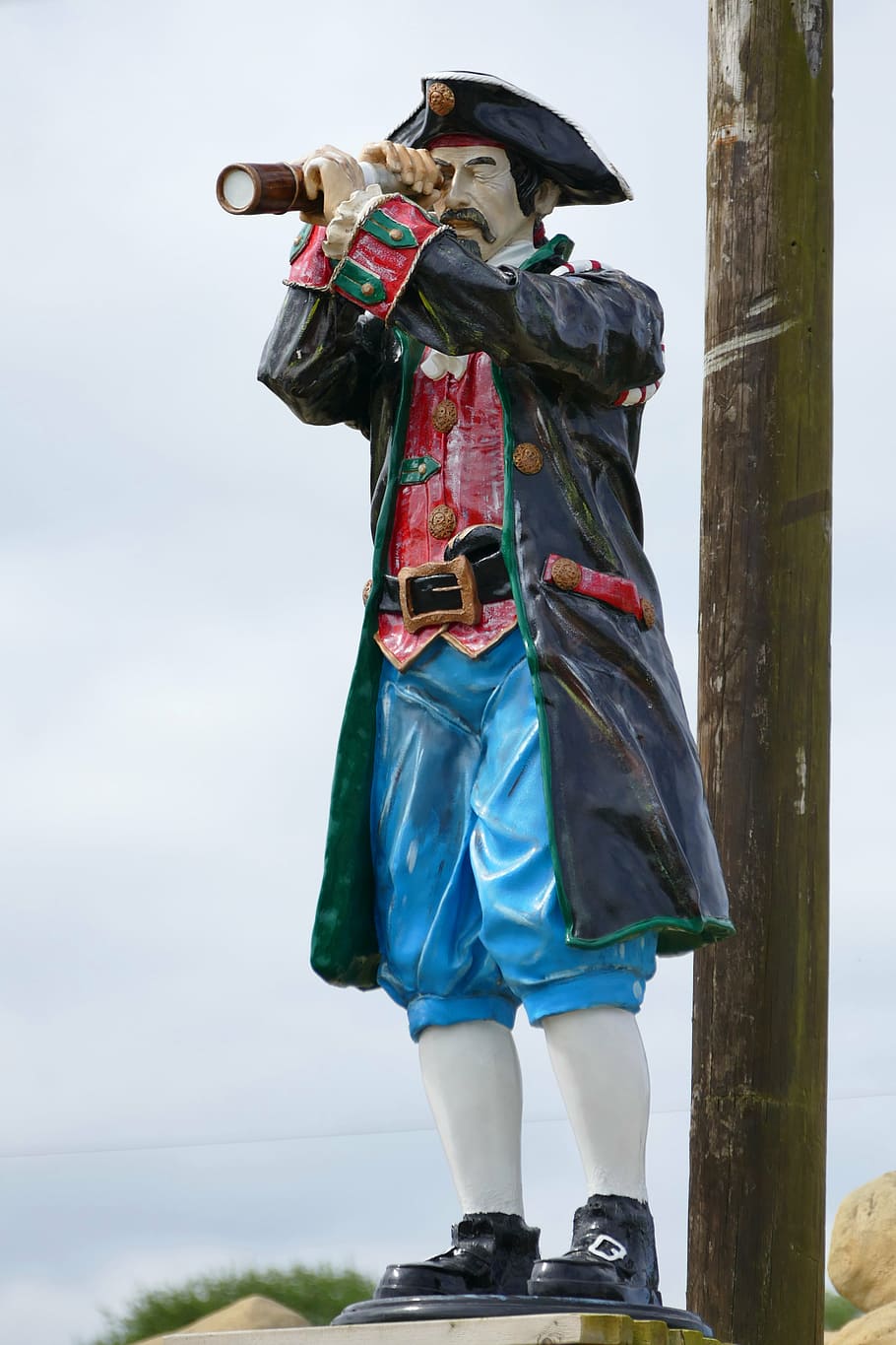 man, wearing, black, jacket, holding, telescope statuette, pirate, sailor, captain, ship