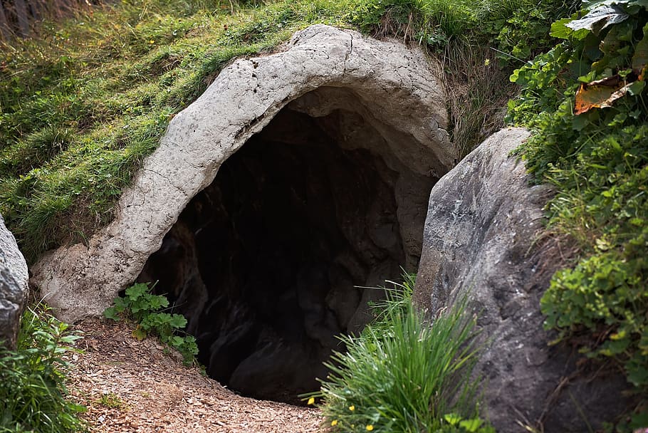 gray, stone tunnel, surrounded, grass field, cave in, green grass, daytime, cave, nature, landscape