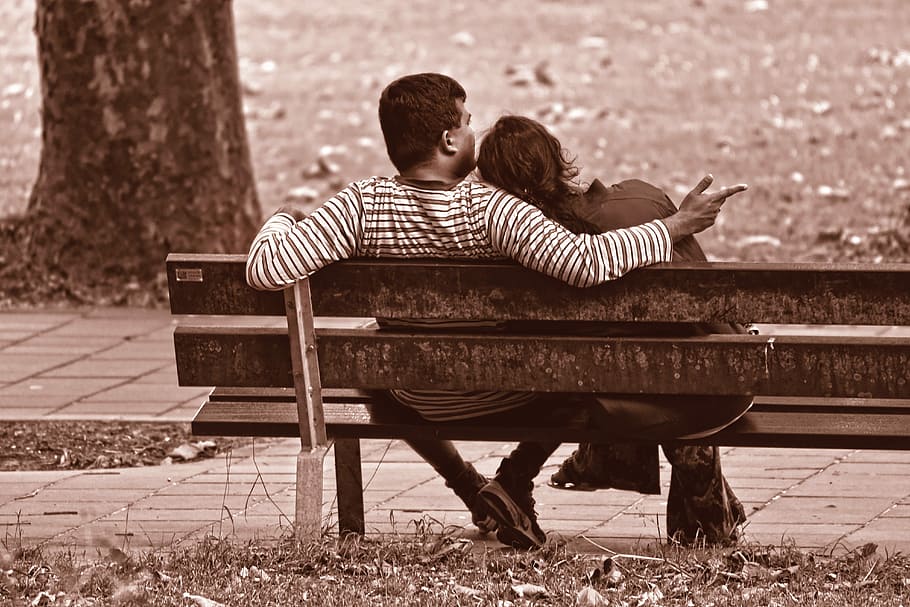man, woman, sitting, bench, people, couple, two, together, head on shoulder, arm around