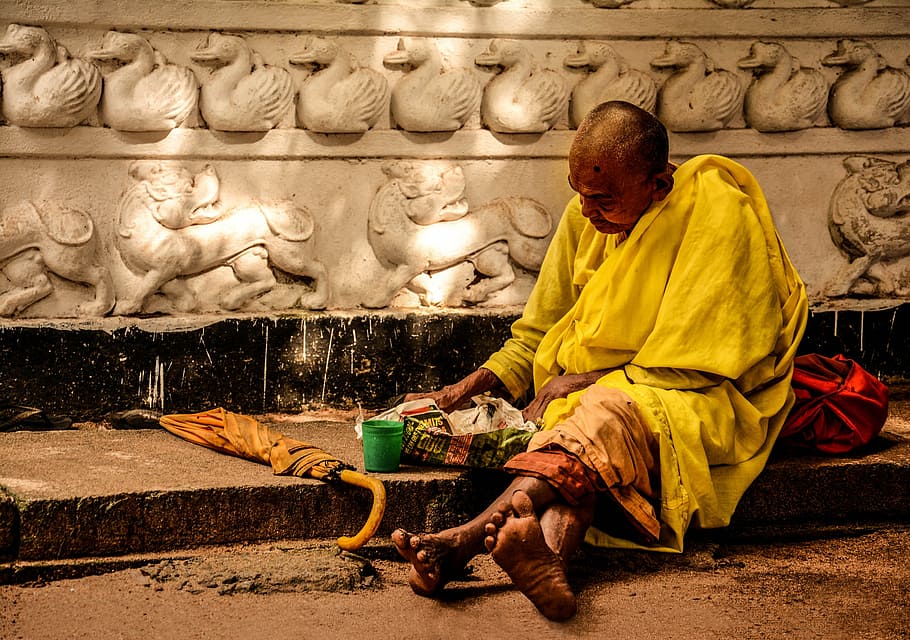 monk, sitting, brown, umbrella, people, homeless, male, street, poverty, social