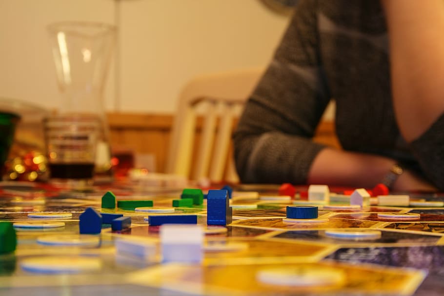 board game, playing, pieces, strategy, consideration, the construction of the, indoors, leisure activity, multi colored, selective focus