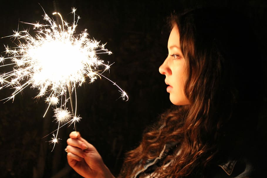 woman, holding, sparkler fireworks, sparkler, fireworks, girl, holiday, flame, brown hair, sparks