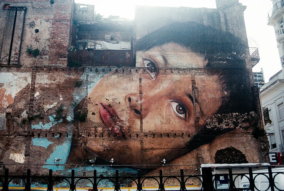 man graphic murals, paint, wall, street, people, woman, art, building, establishment, face