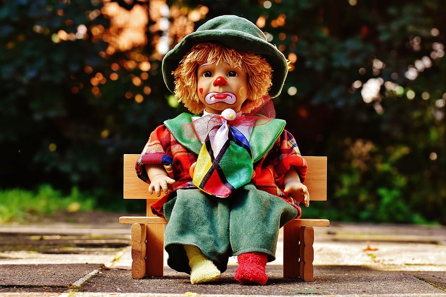 clown doll, sitting, bench, doll, clown, sad, bank, sit, colorful, sweet