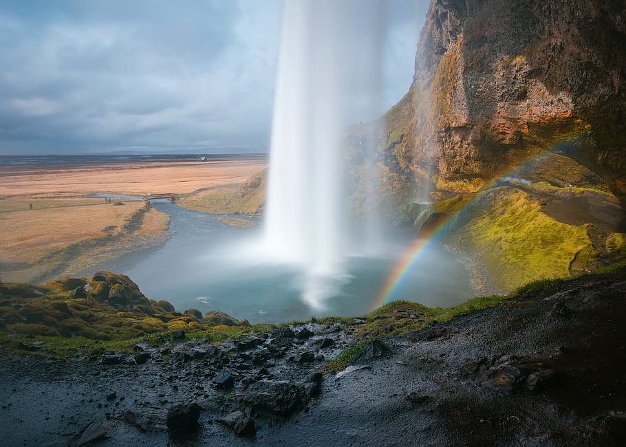waterfalls during daytime, rainbow, waterfalls, rocks, nature, outdoor, mountain, view, hill, green