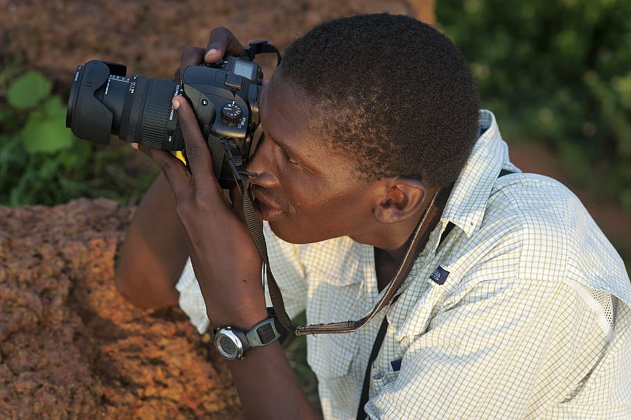 man, holding, black, dslr camera, photographer, photography, african, africa, shoot, taking pictures