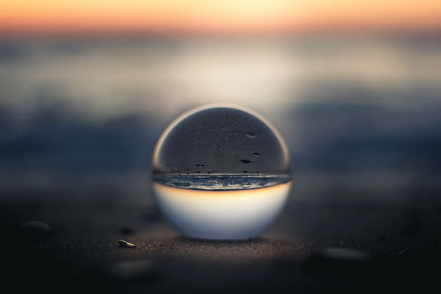 bowl of water, nature, water, glass, sphere, sunset, horizon, beach, reflection, selective focus